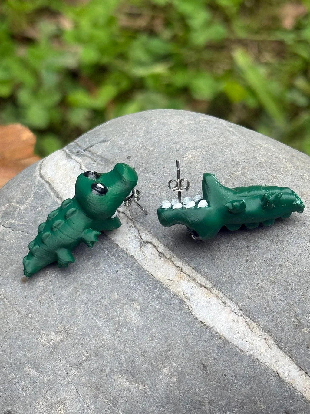 Chomping alligator earrings shown from another angle