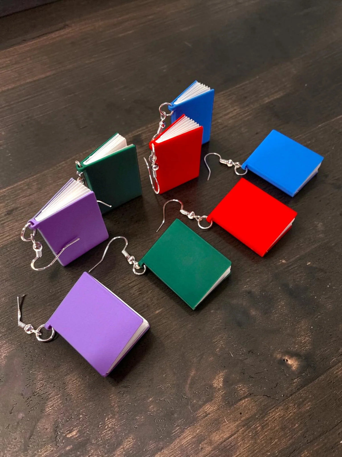 Close-up of the moving pages on 3D-printed book earrings