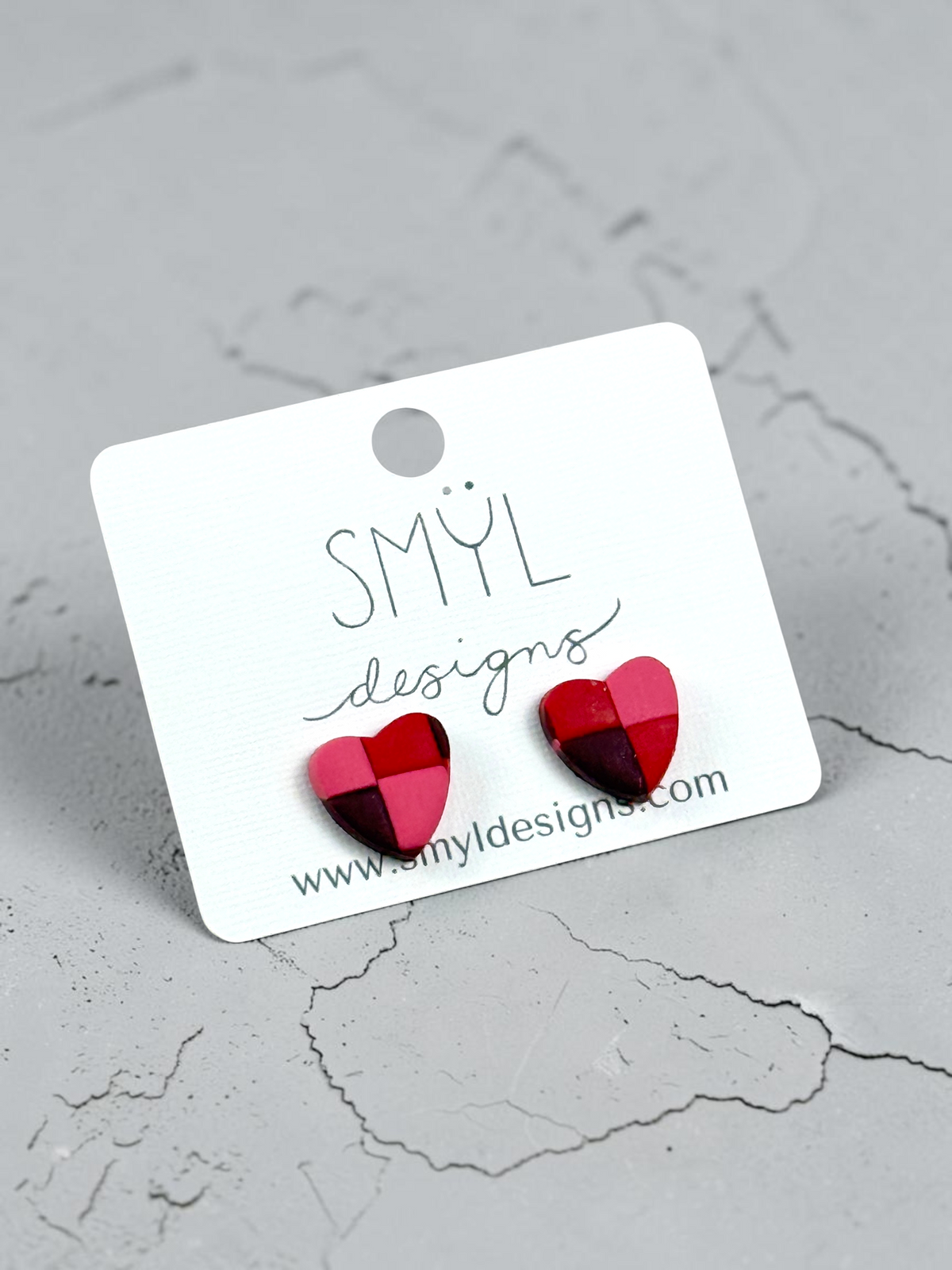 Red, pink, and burgundy patchwork heart stud earrings by SMYL Designs