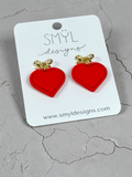 Red single-heart dangle earrings with gold bow studs