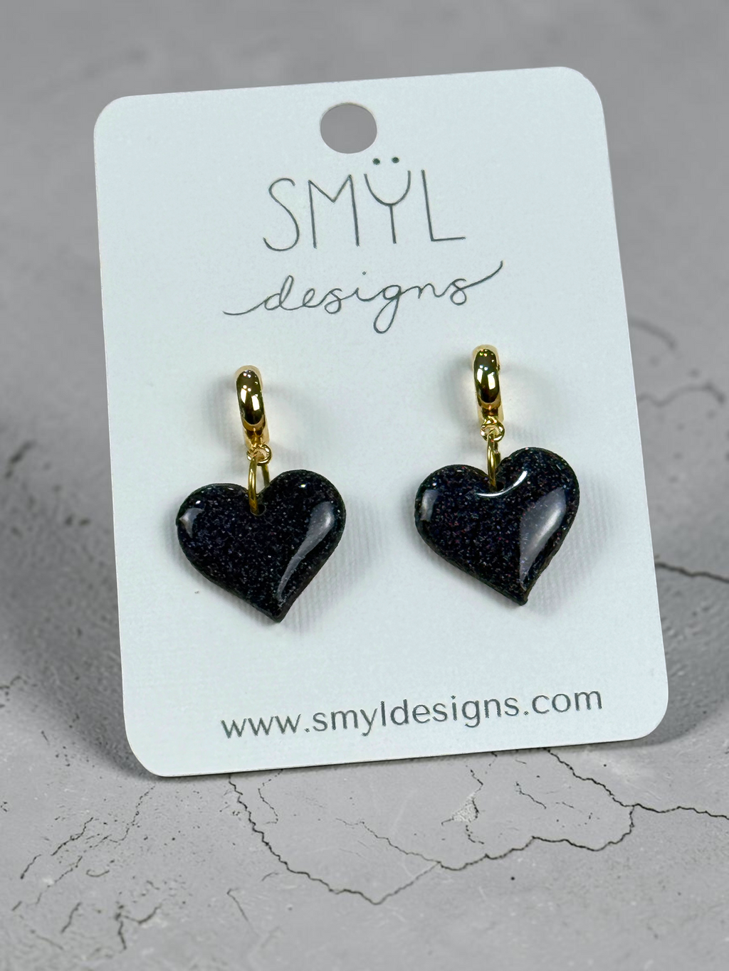 Black glitter heart huggie dangle earrings