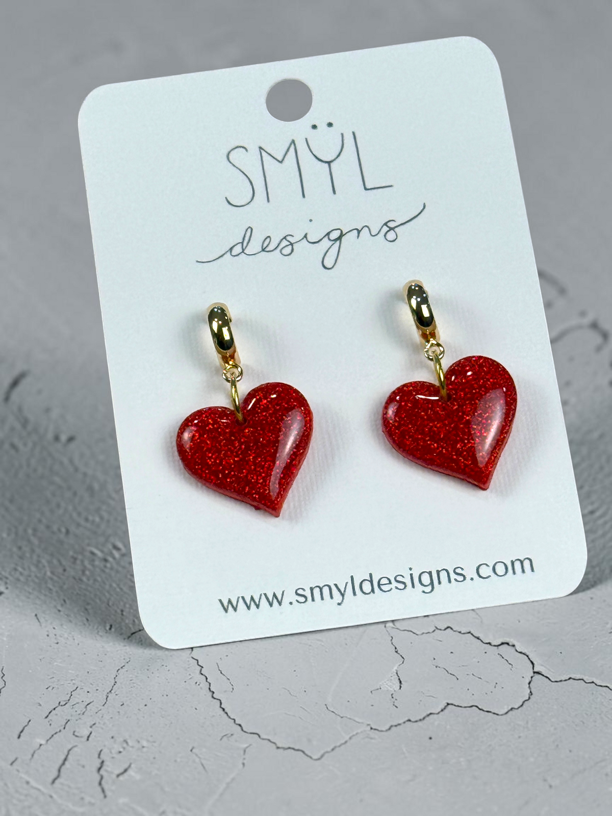 Red glitter heart huggie dangle earrings