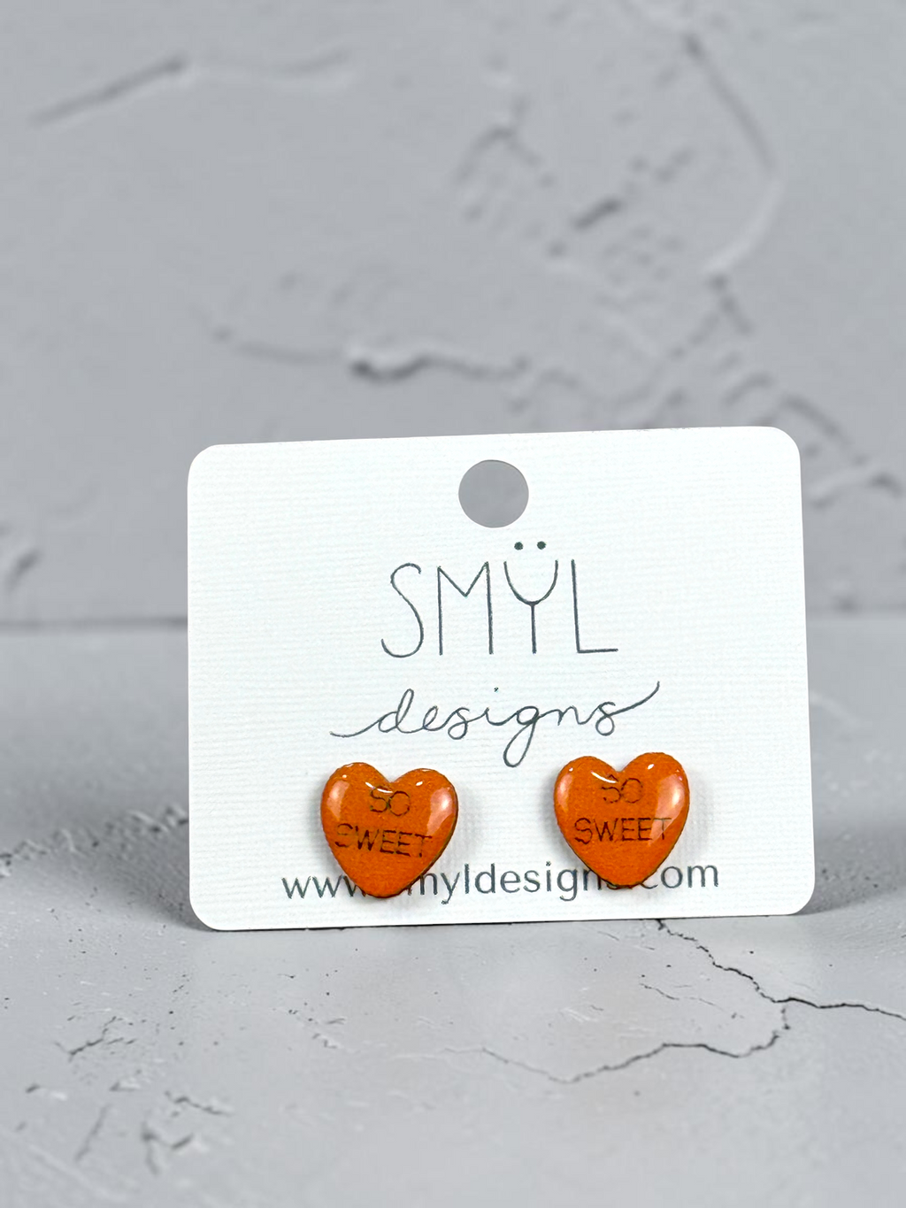 Orange conversation-heart stud earrings