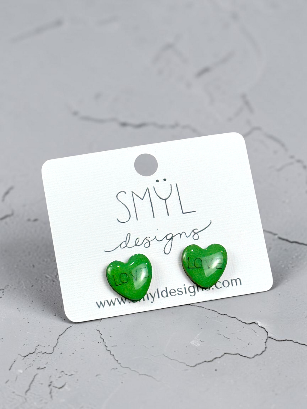 Green conversation-heart stud earrings