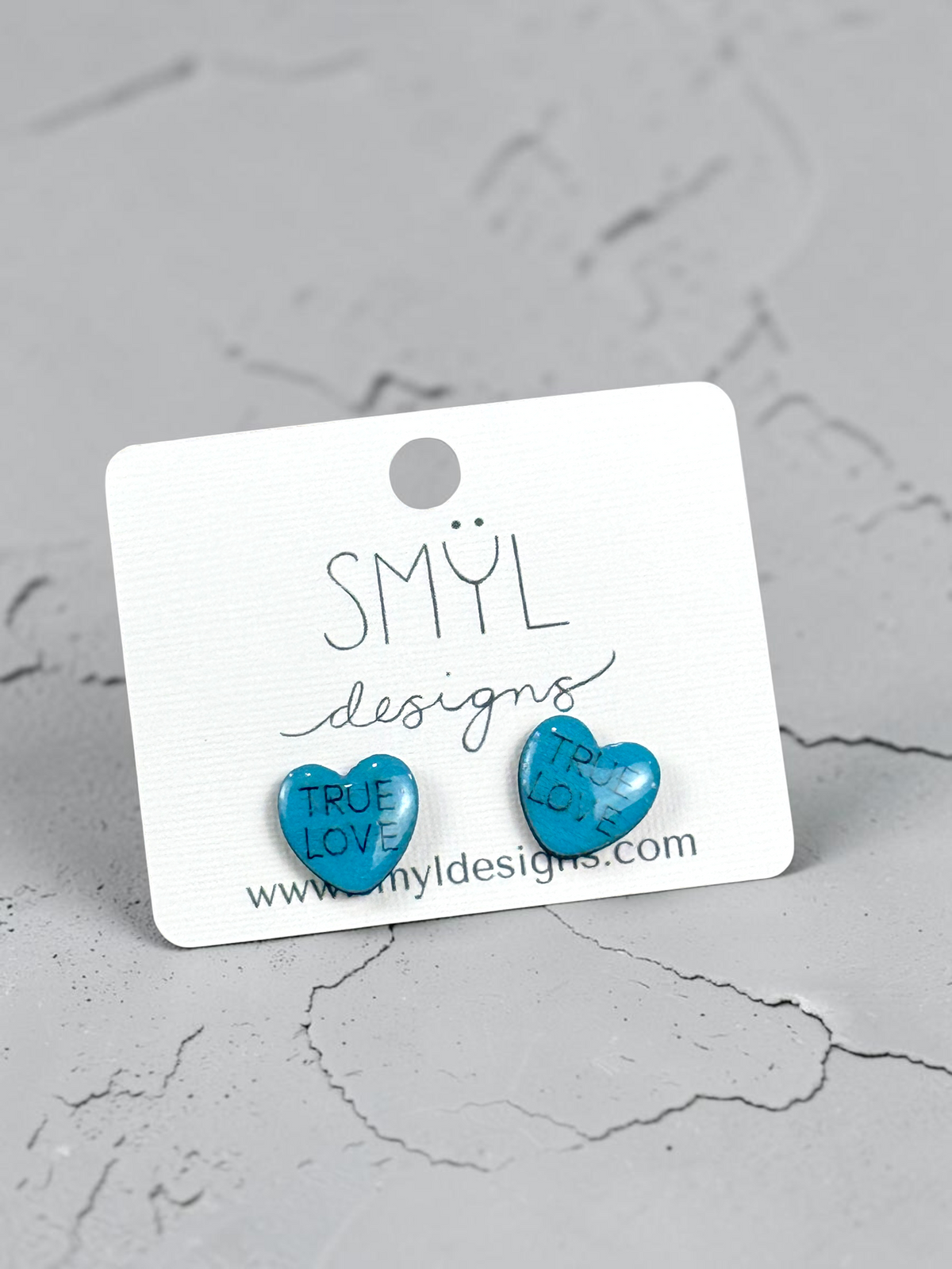 Teal conversation-heart stud earrings