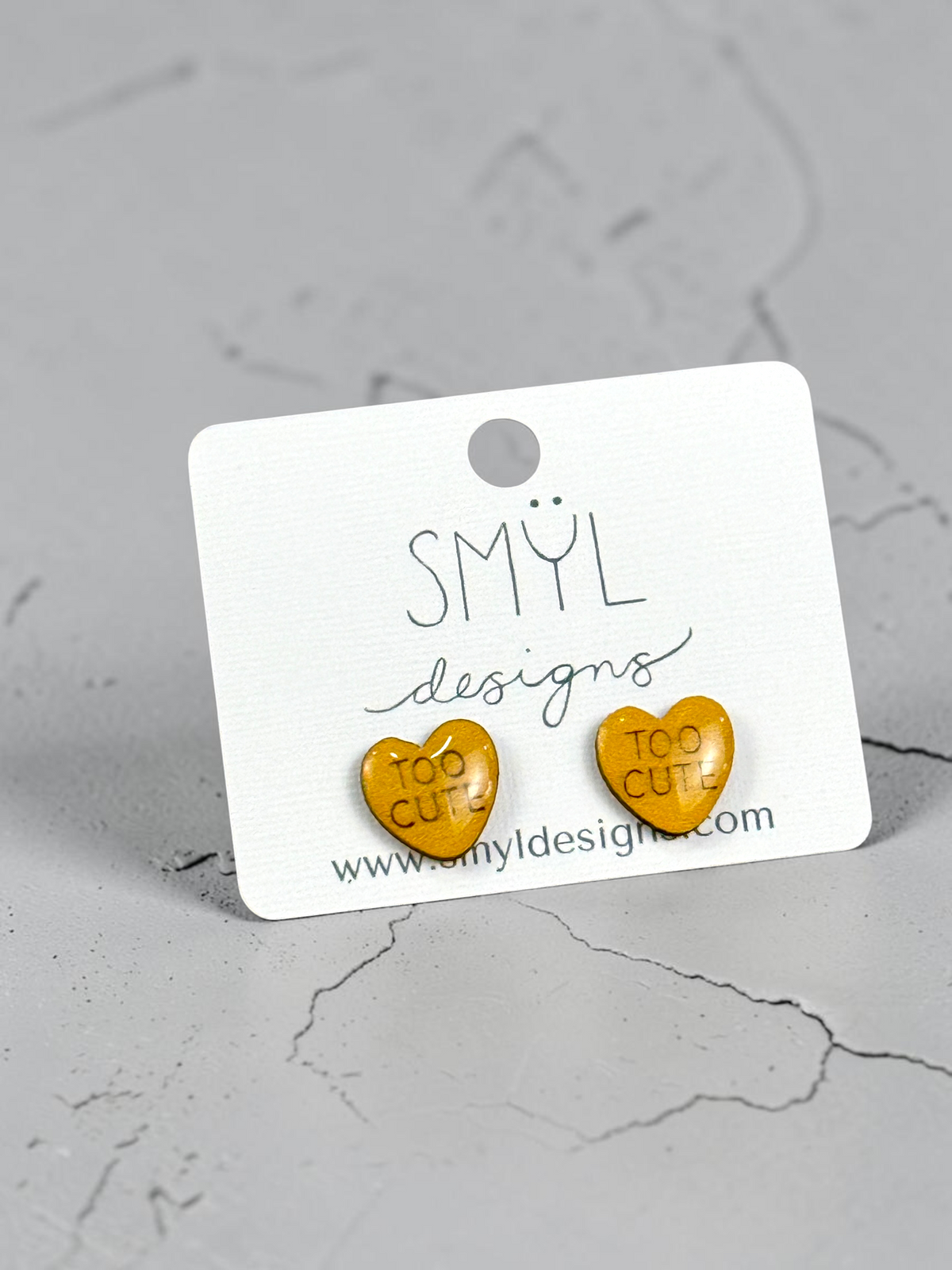 Yellow conversation-heart stud earrings, alternate message