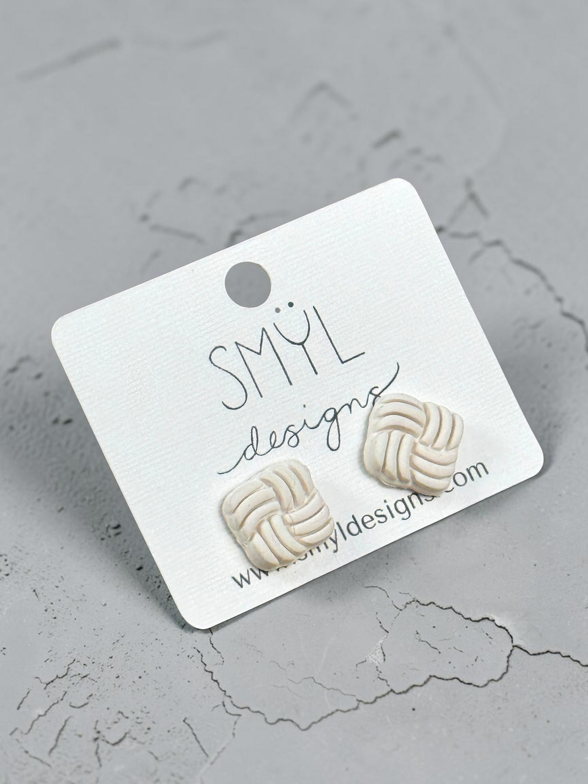 White Celtic knot stud earrings