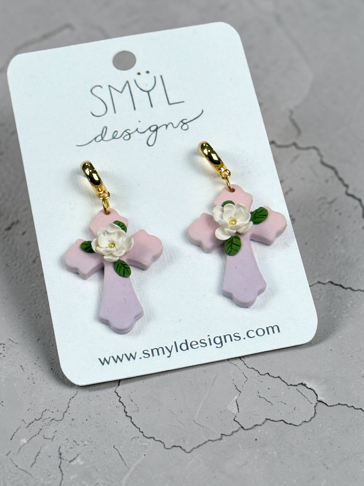 Pink floral cross dangle earrings with white flowers by SMYL Designs