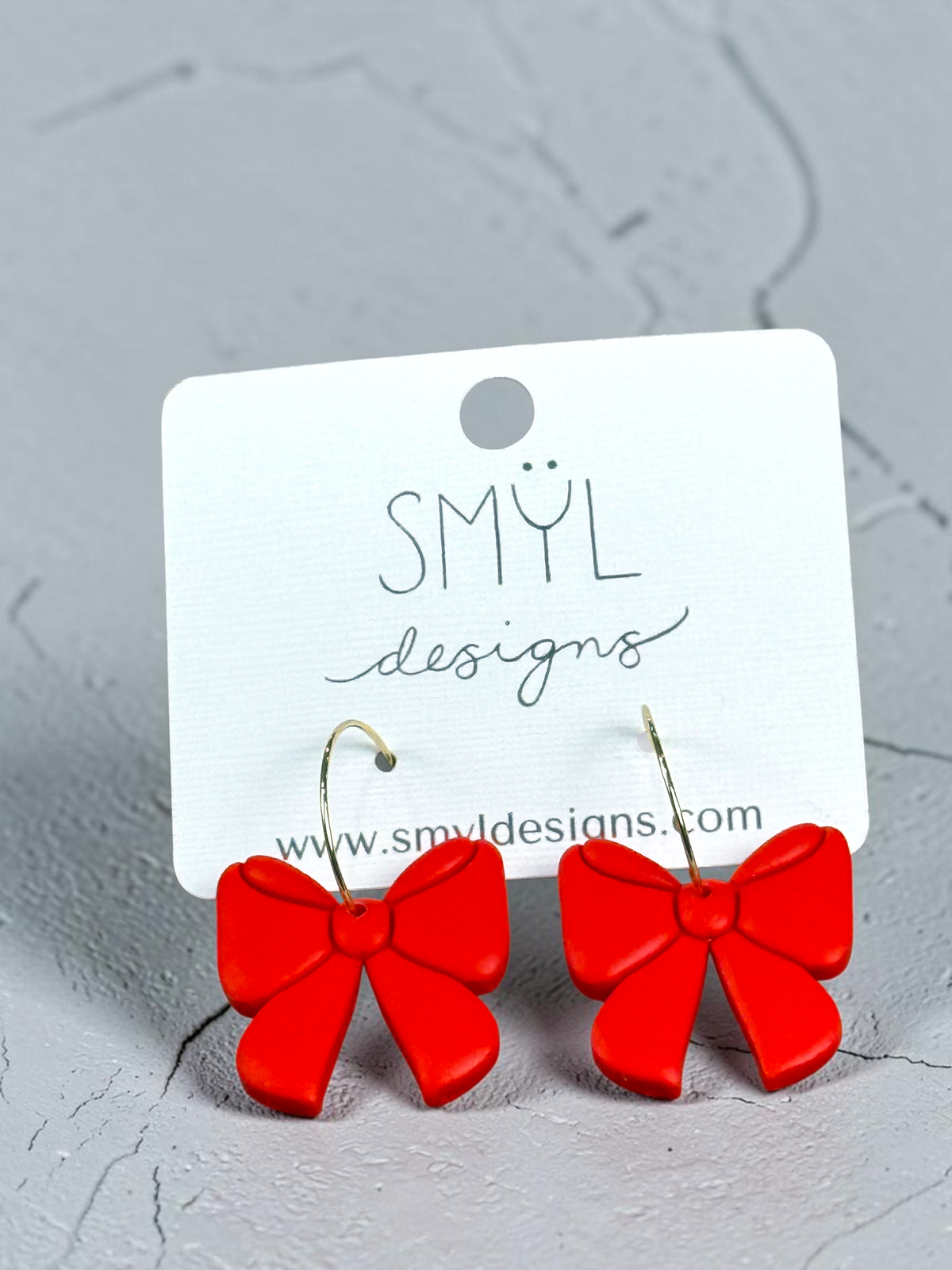 Red large-bow hoop earrings