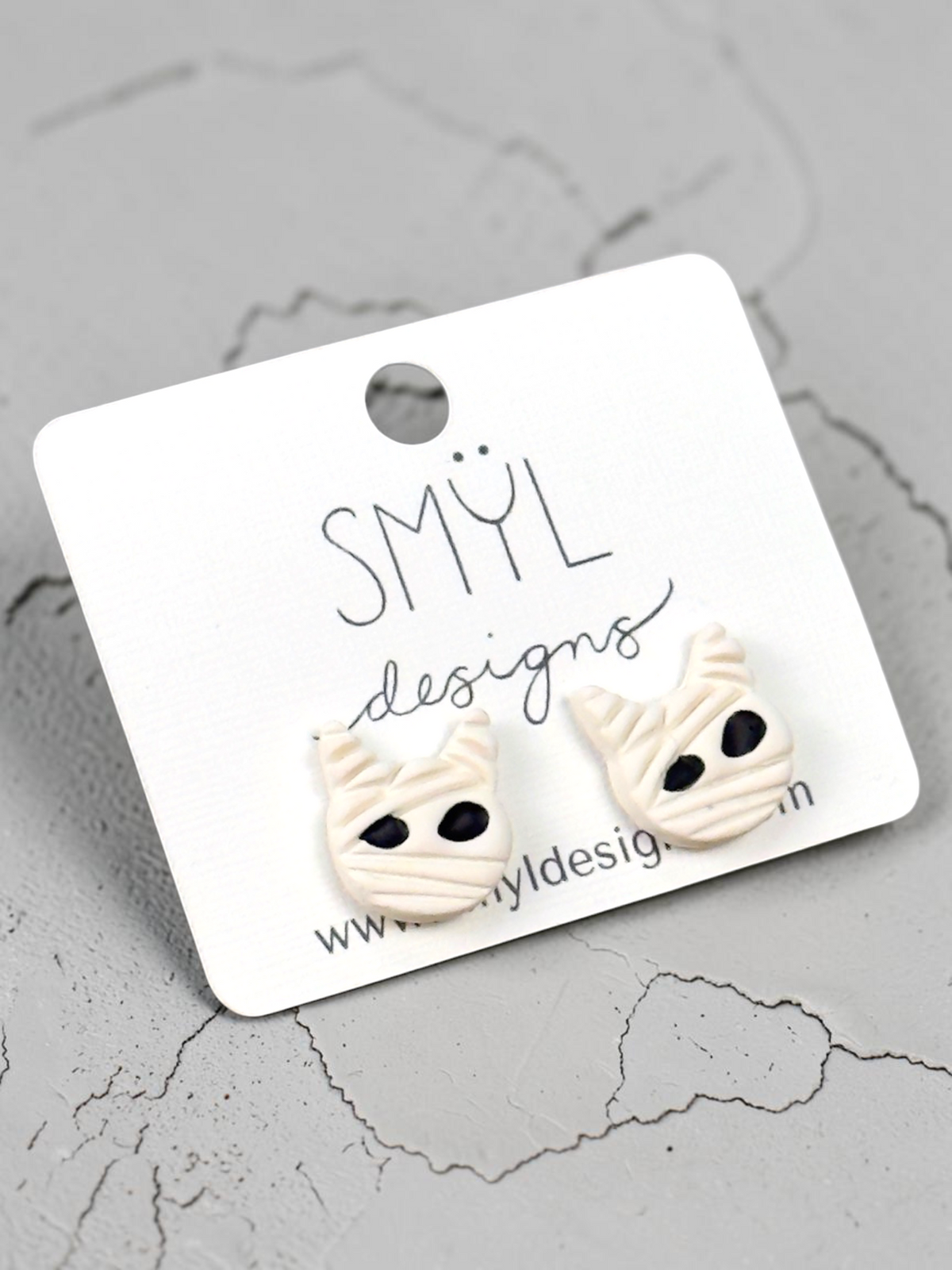 White mummy stud earrings with black eyes by SMYL Designs