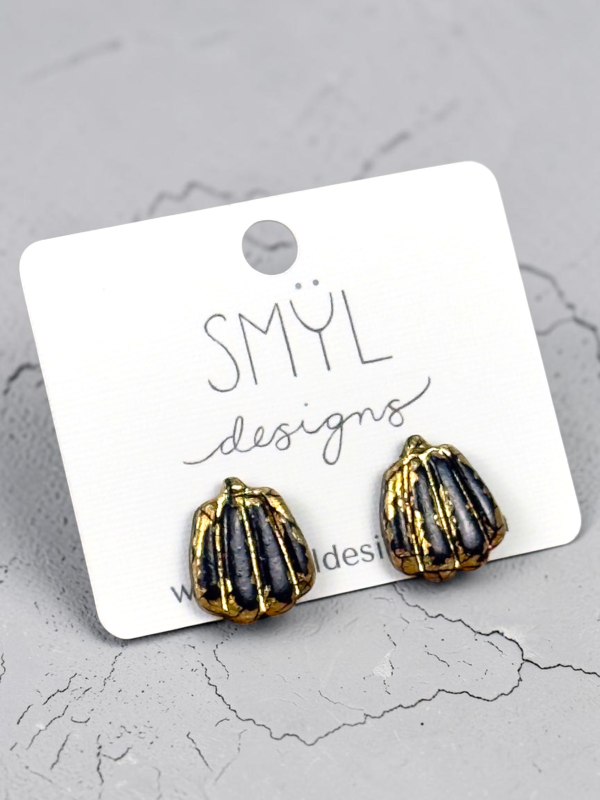 Black tall pumpkin stud earrings with gold accents by SMYL Designs