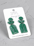 Green fern-pattern arch polymer clay dangle earrings with silver-tone connectors by SMYL Designs