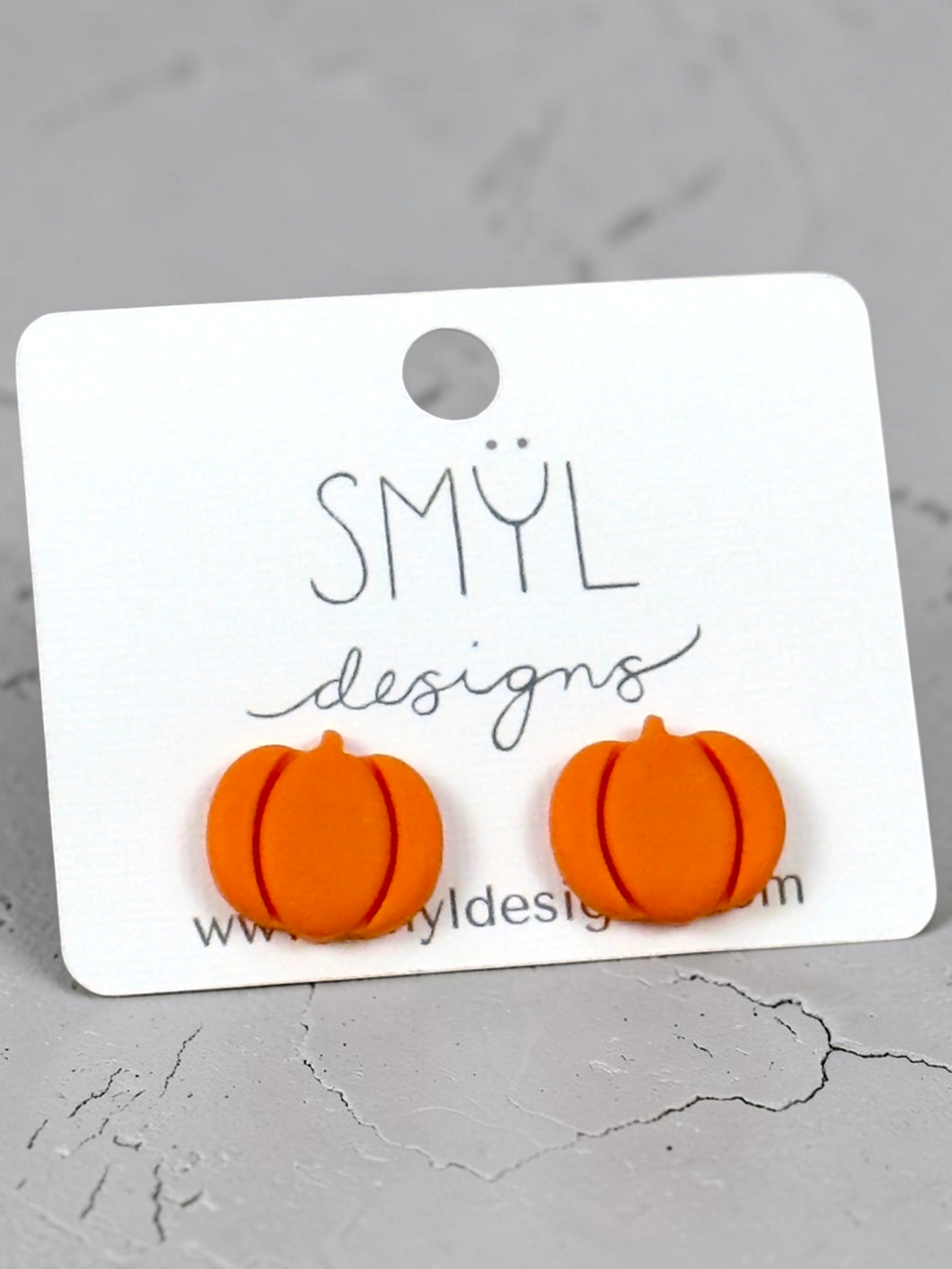 Orange short pumpkin stud earrings by SMYL Designs