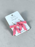 Pink polymer clay bow dangle earrings with gold-tone hooks by SMYL Designs
