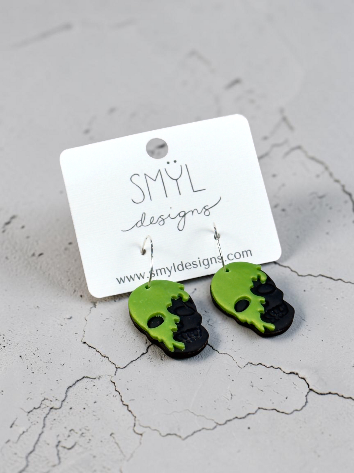Green Split Skull Dangle Earrings by SMYL Designs
